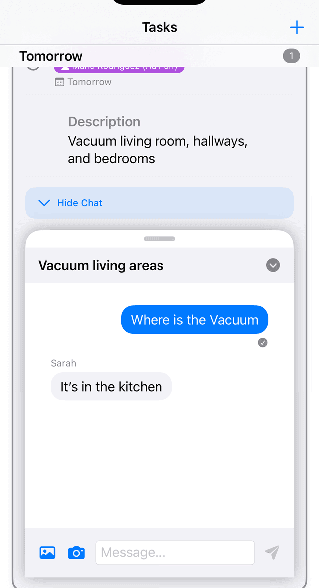 Message Hub within vacuum task showing Maria's question 'Where is the Vacuum' and Sarah's reply 'It's in the kitchen' with task context